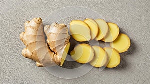Fresh Ginger Root and Slices on Grey Background, Top View
