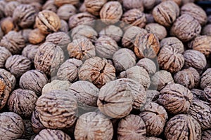 Top down view, whole walnuts displayed on street food market