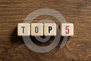 Top 5 , five - word concept on building blocks, text