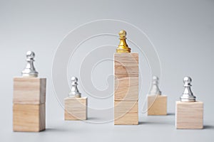 Top of golden chess pawn pieces or leader businessman. victory, leadership, business success, team, recruiting, and teamwork
