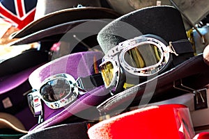 Top hat with ski goggles