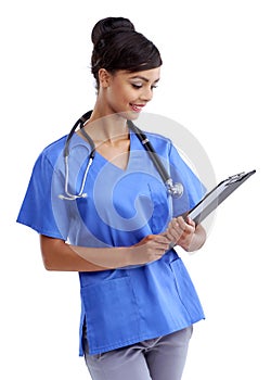 Always on top of her patients progress. Studio shot of a young medical professional isolated on white.