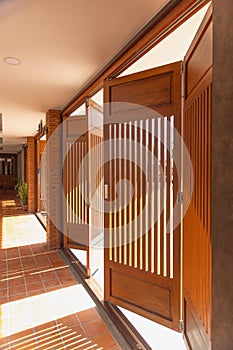 Top hung bifold system for large door panels