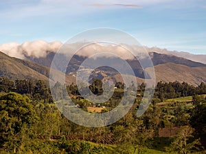 The top of the Iguaque mountain covered by a dense cloud at sunset