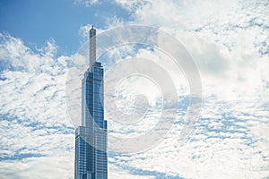 Top image of Landmark 81 is a super tall skyscraper in center Ho Chi Minh City, Vietnam and Saigon bridge with development photo
