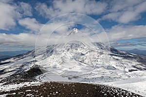 Top of Koryaksky Volcano seen from Avachinksy Volcano, Kamchatka, Russia. Kamchatka in early autumn