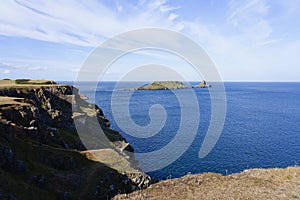 From the top of limestone cliffs to Worms Head island