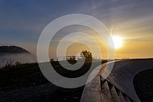 Top of a mining terril during sunset Beringen