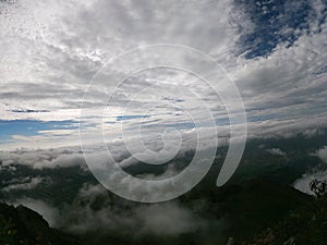 on top of a misty mountain