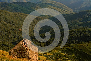 The top of Mount Pip Ivan, a tourist admires the scenery from the top, a hike in the Ukrainian Carpathians, fascinating epic