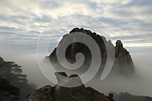 The top of the mountain from the sea of clouds above, Huangshan in China