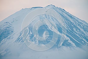 Top of Mt. Fuji covered with snow