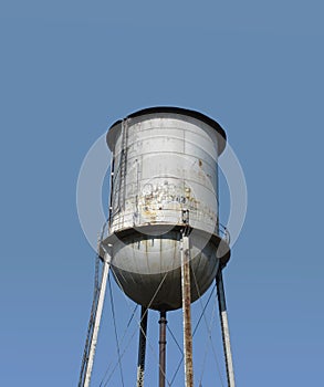 Top of an old fashioned water tower isolated