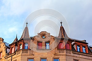 Top of old house with attics and spire photo