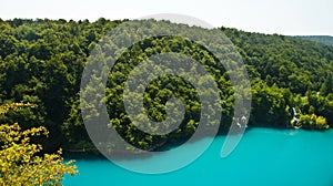 Top panoramic view of Plitvice Lakes, beautiful nature of National Park in Croatia, sunny day