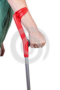 Top part of elbow crutch in male hand