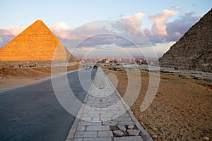 Top part of the highest Giza pyramid of Khufu or Cheops and Cairo city