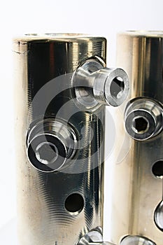 Top part of large diameter electric cable connection tubes with allen key screws, made of stainless steel