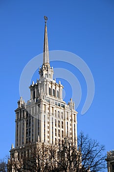 Top part of Radisson Collection Hotel in Moscow Russia under cloudless blue sky