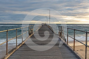 on top of the port noarlunga jetty at sunset in south australia on April 19th 2021