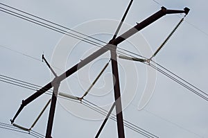 Top of power line tower with nine cables