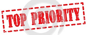 TOP PRIORITY text written on red stamp sign