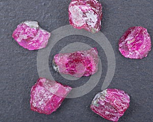 Top quality A grade small rough RUBY crystals from Tanzania on black. RED CORUNDUM.