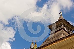 The top and roof of the watchtower in Rostov the Great against the sky.