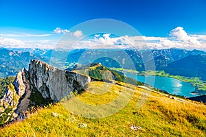 Top of Schafberg hill, Austria. View of big rock on top of mountain. Summer hiking