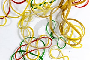 Top shot of colorful rubber bands with white background