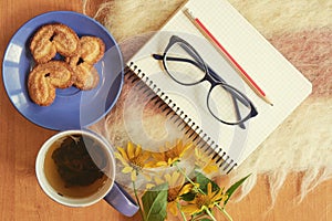 Top shot of writer breakfast with notebook