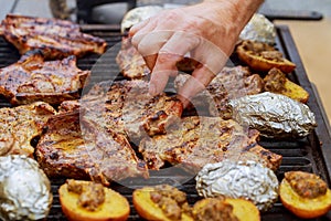 A top sirloin steak flame broiled on a barbecue, shallow depth of field.