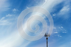 Top Of Small Radio Tower On Sky Background