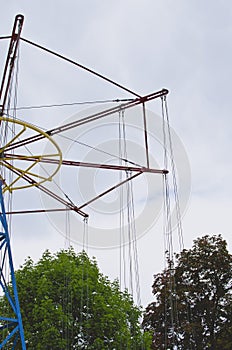 The top of the spinning swing ride in the carnival.