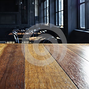 Top of table with Blurred Bar Cafe Restaurant Interior