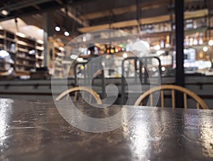 Top of table and chair with Blurred Bar restaurant background