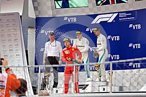 Top three finishers on the podium. Formula One. Sochi Russia.