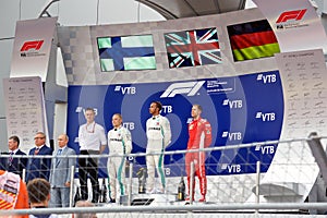 Top three finishers on the podium. Formula One. Sochi Russia.