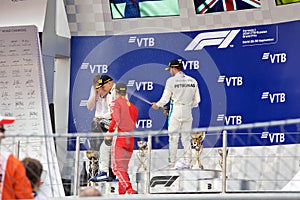 Top three finishers on the podium. Formula One. Sochi Russia.