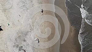Top to Bottom View Ocean Waves Crashing onto Sandy Beach - Aerial Drone Arambol Goa, India Asia