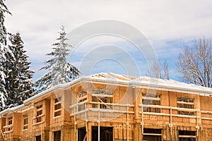 Top of townhome complex under construction on winter time