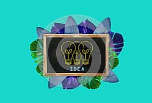 Top veiw, Idea creation concept on black bord blue green leaf frame isolated pastel cyan background for design advertising or