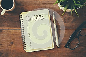 Top view 2017 goals list with notebook