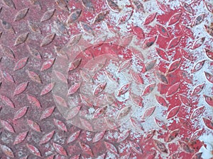 Top view, Abstract stainless steel plate diamond pattern painted dark red white color texture background for graphic design or