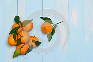 Top view accessories Chinese new year festival decorations.orange,leaf on blue background