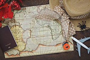 Top view of accessory Happy Halloween with items to travel background concept.