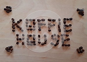 Top view of an advertisement with coffee beans with the expression "Koffie House"