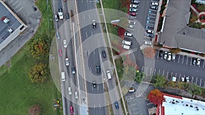 A top view aerial a heavy traffic jam during peak rush hour, where cars are moving slowly on highway