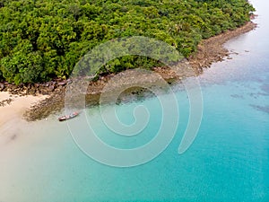 Top view or aerial view of long tail boat on Beautiful crystal c