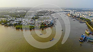 Top view aerial view love bridge or Ninh Kieu quay of downtown in Can Tho City, Vietnam with development buildings, transportation